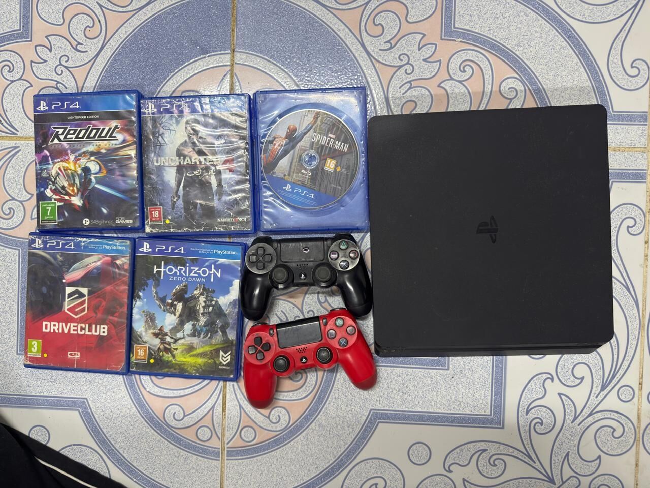 SAR 550, PS 4 Slim (2 Controllers) 5 Games